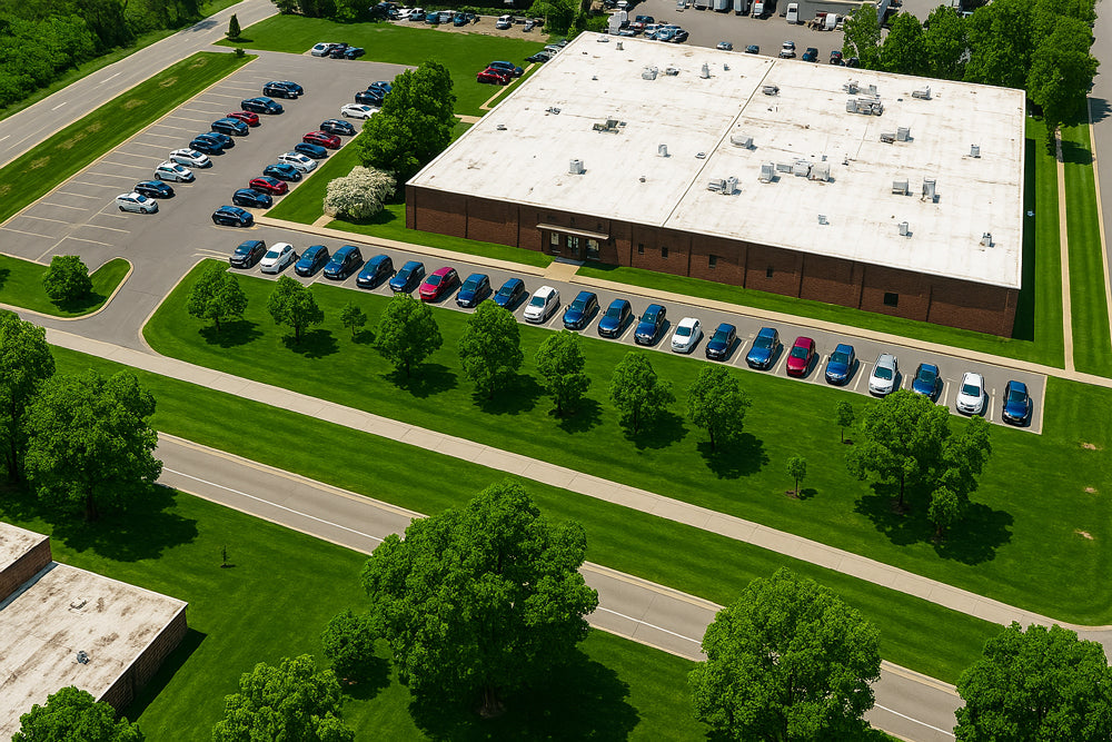 Aerial view of the WOODCHUCK USA manufacturing facility and headquarters surrounded by green lawns.